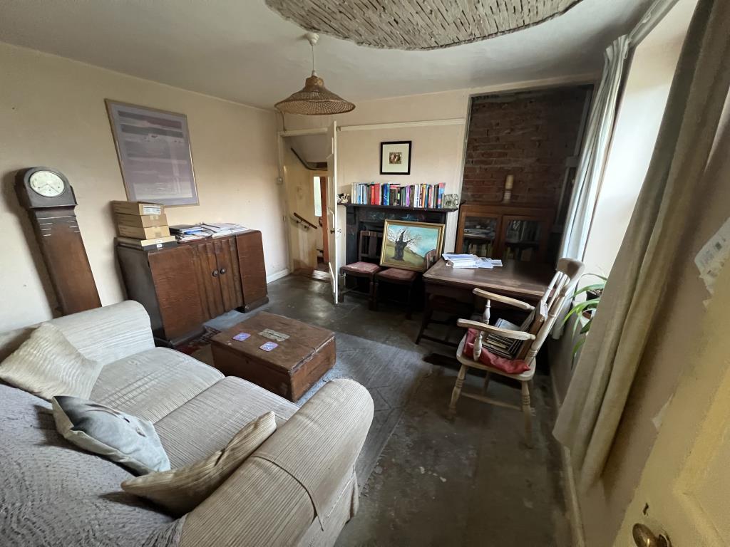 Lot: 16 - DETACHED THREE-BEDROOM COTTAGE FOR IMPROVEMENT WITH PLANNING FOR EXTENSION - General view of the living room-reception 1
